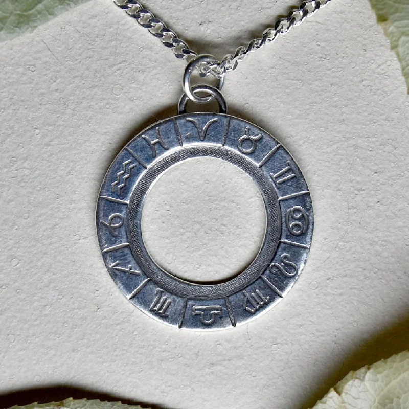 'Zodiac Cycle' Die Struck Silver Necklace